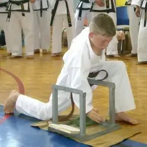 Young student practicing block technique
