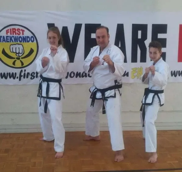 Parents and children training in Taekwondo class