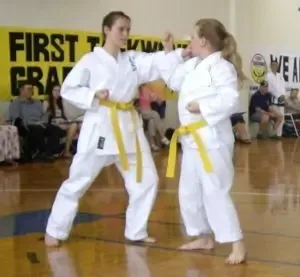 Women practicing self defence techniques
