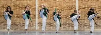 Children line up in Taekwondo class